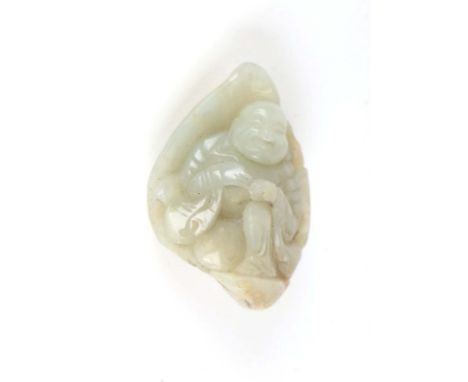 A Chinese carved jade Buddha pendent, 5cm high.