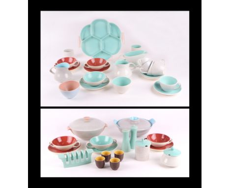 A quantity of assorted Poole Twin Tone pottery tablewares including plates, cups, jugs, hors d'oeuvre tray and other similar 