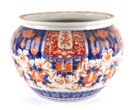 A late 19th century Japanese Imari planter, 22cm high. 