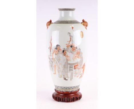A large Chinese Republic type baluster vase decorated with what seems to be the Five Chinese Elements, bathing children with 