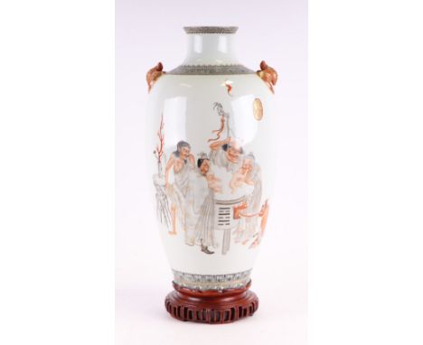 A large Chinese Republic type baluster vase decorated with what seems to be the Five Chinese Elements, bathing children with 