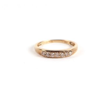 A 9ct gold and diamond half hoop ring, approx UK size 'N', 2g.