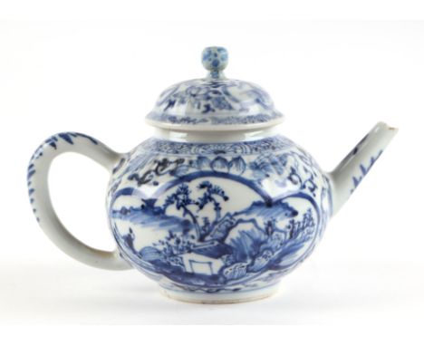 A Chinese blue and white teapot decorated with figures within panels, probably Kangxi, 11cm high. Condition ReportRepair to t