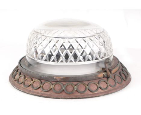 A Edwardian ceiling light with cut glass circular shade within a copper mount with traces of gilt decoration. 41cm diam.