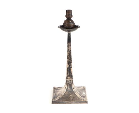 An Arts and Crafts silver table lamp, with tapering square section column and square base with simulated riveted strap work d