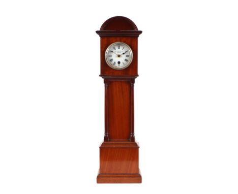 A late 19th / early 20th century mahogany cased miniature longcase clock, the white enamel dial with Roman numerals and signe