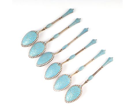 A set of six continental silver gilt and enamel teaspoons, 75g (6).Condition ReportAll of the teaspoons are in good overall c