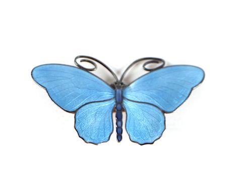 Magnus Aase (Norwegian) - a blue enamel and silver butterfly brooch, 6cm wide. Condition ReportThe right hand wing has a very