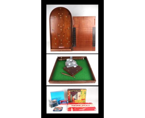 Assorted pub bar games to include a Shove Ha'penny board; a Bagatelle board, a Bar Skittles board, a Solitaire board, Monopol