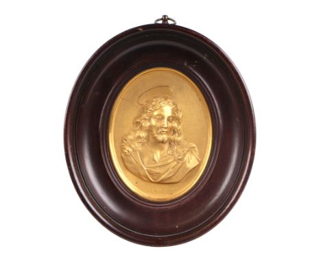 An 18th century gilt gesso relief oval bust portrait depicting the Head of Christ, with paper label to verso 'B Boyes 1723-17
