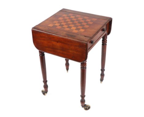 A Victorian mahogany drop-flap games table with chess board top, on turned legs, 48cm wide.