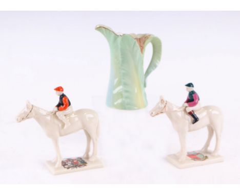 Two Carlton china crested ware horse and jockey figures, city of Cardiff and Newmarket; together with a Royal Worcester milk 