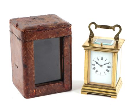 A late 19th century / early 20th century French carriage clock, the rectangular white dial with Roman numerals and blue steel