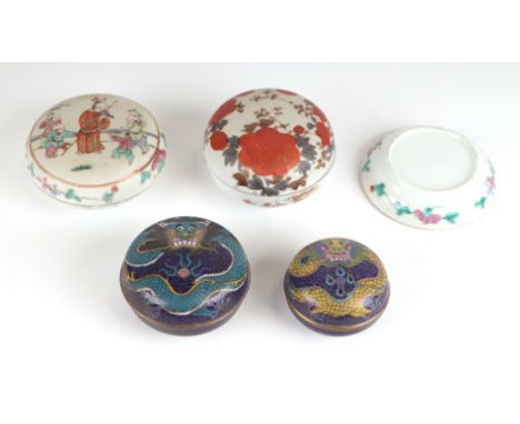 A Chinese famille rose paste box of compressed circular form decorated with young boys playing on a terrace, 9.5cm diameter; 