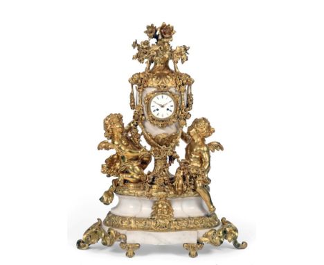 A Large and Impressive Ormolu and White Marble Striking Mantel/Centrepiece Clock, late 19th century, the highly elaborate cas