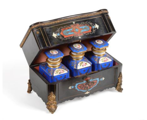 A French Brass Mounted Ebonised and Boullework Caddy, circa 1860, of serpentine rectangular form, on cast scroll feet, contai