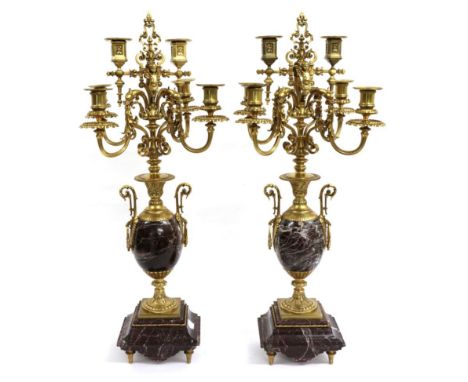 A Pair of French Gilt Metal Mounted Marble Six-Light Candelabra, in Renaissance style, with scroll and baluster branches, scr