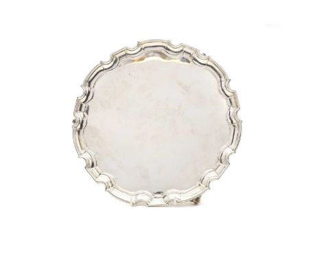 A silver salver by William Hutton &amp; Sons Ltd, Sheffield 1936, with a piecrust border,30.5cm wide28.9oztCondition ReportMi