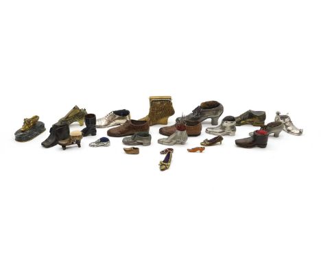 A collection of bronze, brass, metalware and wood shoes, 19th century and later, snuff boxes, pin cushions, including a rolle