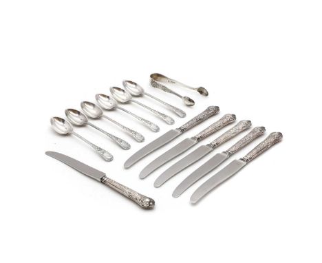 A collection of silver cased flatware to include a cased set of silver handle knives by Harrison Brothers, Sheffield 1975, in
