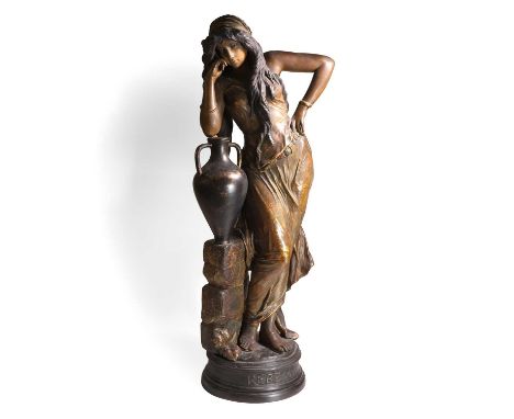A Goldscheider terracotta sculpture, c.1900, 'Rebecca', designed by Cherc, modelled as a maiden with a water vessel by a well