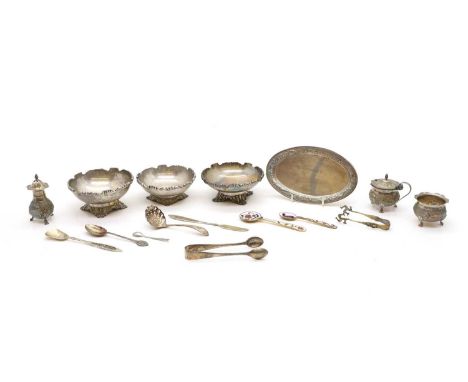A collection of Indian silver comprising a minature cruet set, marked Sterling, comprising a pepperette, mustard pot, salt, a