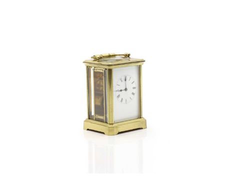 A French brass cased carriage clock, 20th century, with an enamelled face, with Roman numerals, 17cm high overallCondition Re