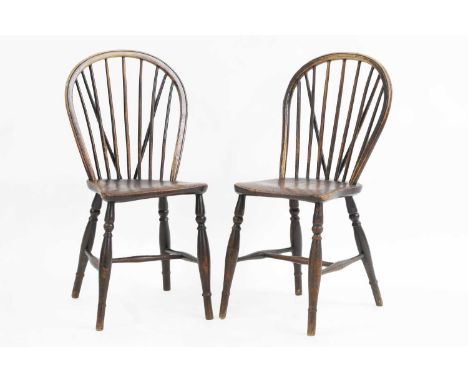A pair of stick hoop back yew and elm Windsor chairs 19th century, West country 31cm wide41cm deep86cm high, seat 44cm high
