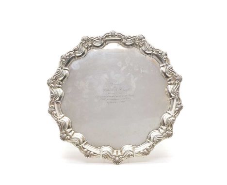 A silver salver, by William Hutton &amp; Sons Ltd, London 1905, with pie crust border, scallop shell decoration, with persona