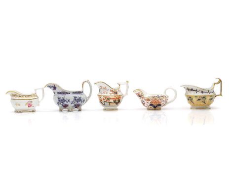 A collection of ten porcelain cream jugs, late 19th century to early 20th century, to include stoneware and porcelain, Crown 