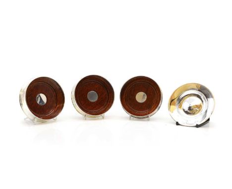 Three modern silver coasters,  by R&amp;D, London 2000, 12.5cm diameter, and a similar silver dish,12.7cm4.1ozt weighable (4)