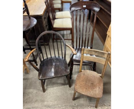 A Victorian elm and beech rocking chair, a child's beech chair and an Ercol chair