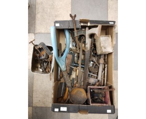 A box of assorted vintage tools, including clamps, etc