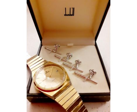 A set of 4 Dunhill silver tone knot style shirt studs in branded box together with a vintage Lorus gents gold tone watch.Loca