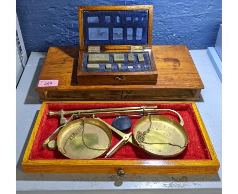 A set of Post Office scales with a cased set of weightsLocation: 
