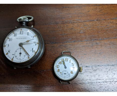 An early 20th century metal cased The Glow Worm pocket watch, white enamel dial with Arabic numerals, offset seconds at 6, mo