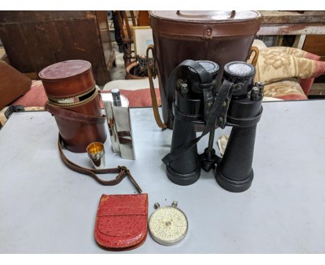 A group of leather cased items to include a Fowler's calculator in a red leather case, a Barr and Stroud CF41 7 x field milit