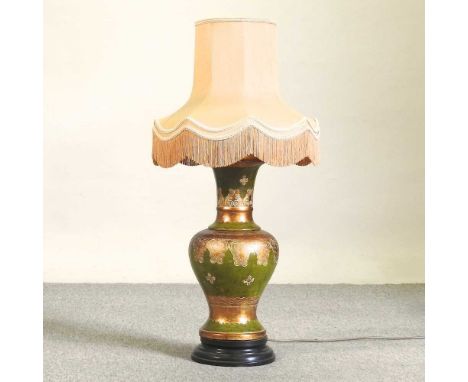 A large toleware style table lamp and shade