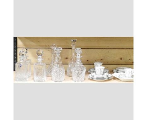 A collection of seven various cut-glass decanters, largest 33cm high, together with a Coalport part tea service