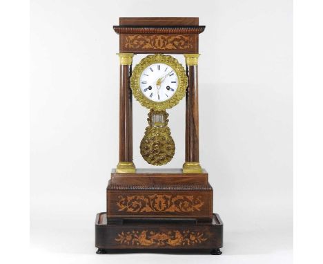 A 19th century continental rosewood cased portico clock, on stand55cm high overall