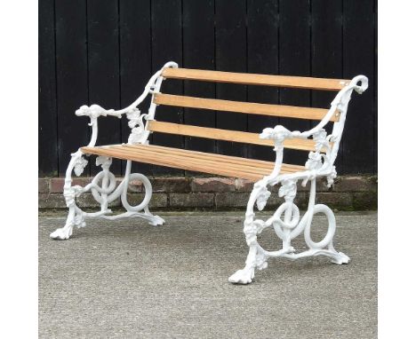 A Victorian style white painted metal and hardwood slatted garden bench, with dog and serpent121w x 64d x 74h cm