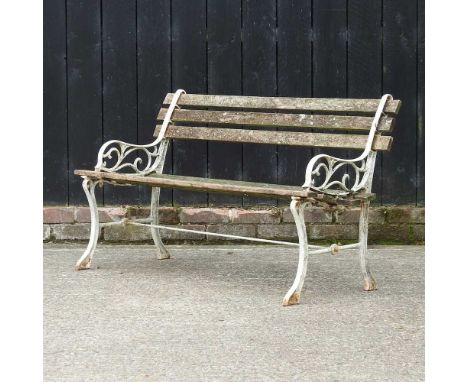 A cast iron and wooden slatted garden bench121w x 55d x 70h cm