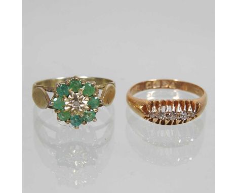 An 18 carat gold five stone diamond ring, 2.9g, size L, together with a cluster ring, 2.5g, size M (2)