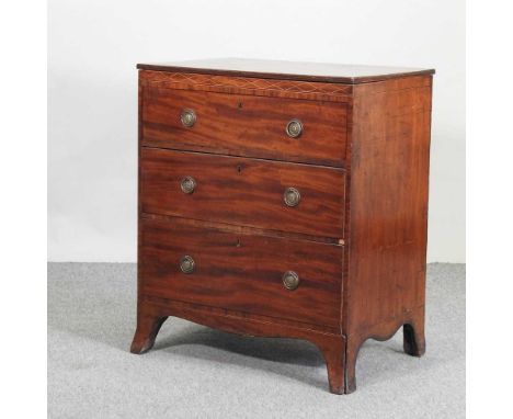 A Regency mahogany and boxwood strung commode, on swept bracket feet71w x 48d x 85h