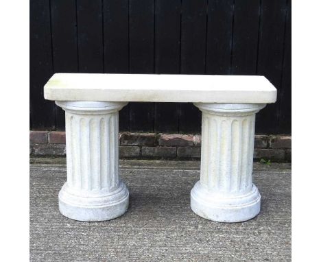 A cast stone garden bench, on column supports107w x 36d x 66h cmCondition report: Top is matched to columns