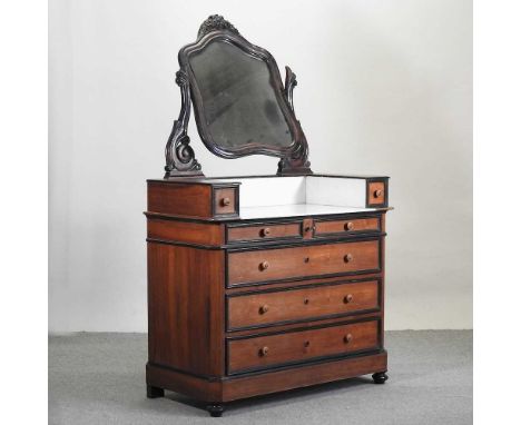An early 20th century French dressing chest, with a marble top and shaped mirror113w x 54d x 185h cm overallCondition report: