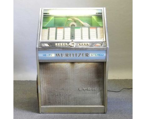 A 1960's Wurlitzer Lyric jukebox, with records80w x 68d x 125h cmCondition report: The selector does not work, but it will tu