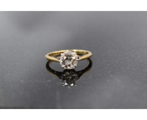 An old cut diamond solitaire ring, approx 1ct in an eight claw setting on a gold loop, no marks, size K &amp; approx 2.2g
nic