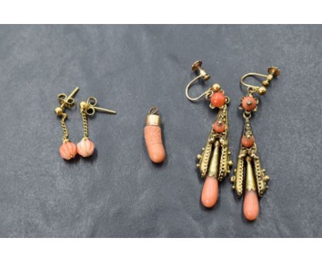 A pair of screw back Victorian yellow metal earrings stamped 9ct having coral chandelier drops, a modern pair of coral bead e