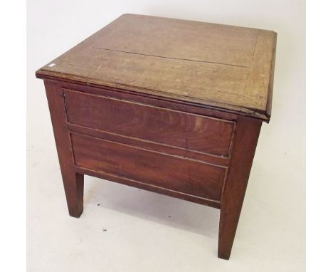 A Georgian mahogany commode with liner and rise top
